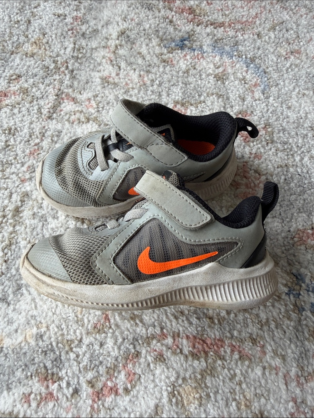 Nike Kids Light Gray Mesh Sneakers with Black Linings and Orange Accents